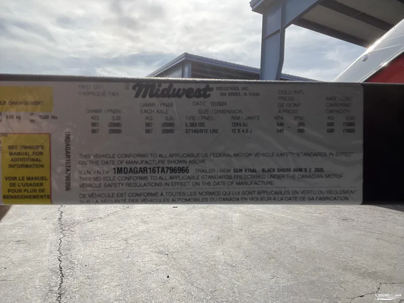 Slide: The Image of Label on a 2025 Lund 1650 Angler Sport, detailing specifications and compliance information. - 15