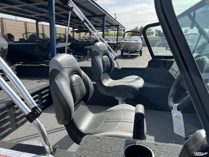 Slide: The Image of 2025 Lund 1650 Angler Sport boat interior with sleek seating and modern design. - 5