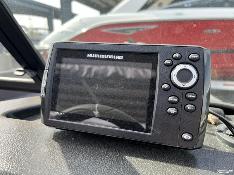 Slide: The Image of Humminbird Helix 5 fish finder on 2025 Lund 1650 Angler Sport boat dashboard. - 7
