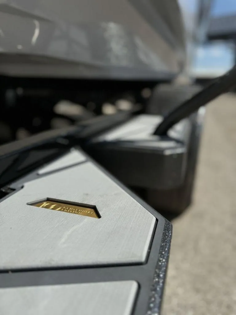 Slide: The Image of Close-up of 2025 Nautique Paragon 25 boat detail, featuring sleek design elements. - 23