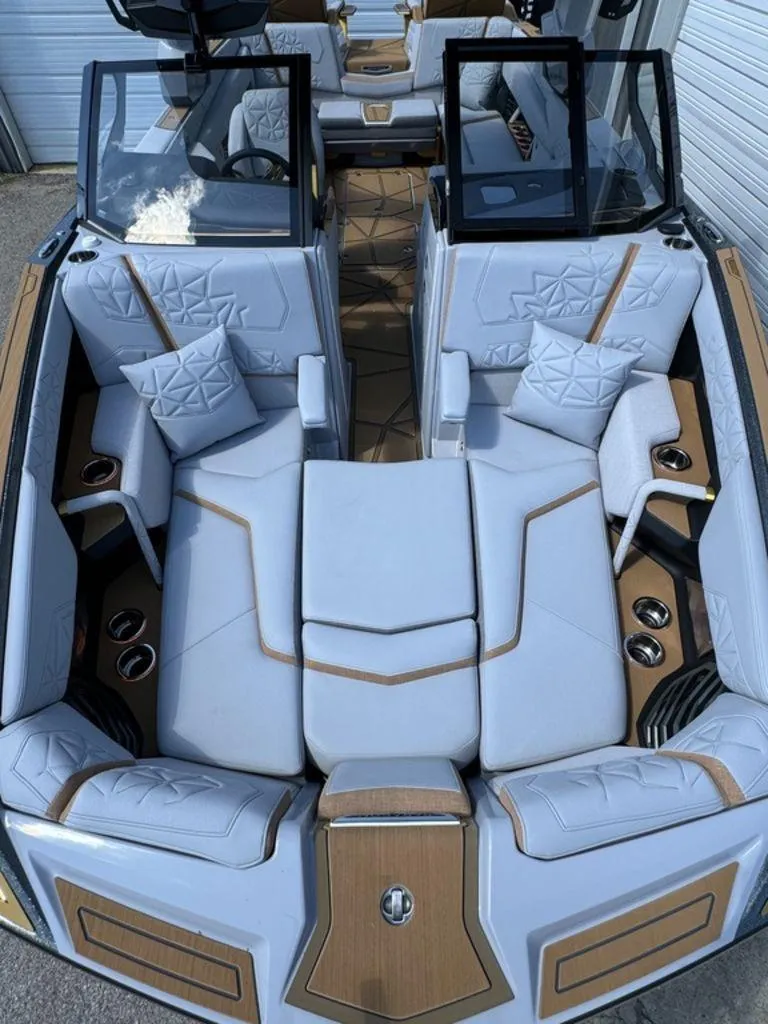 Slide: The Image of Luxurious interior of 2025 Nautique Paragon 25 boat with plush seating and modern design. - 3