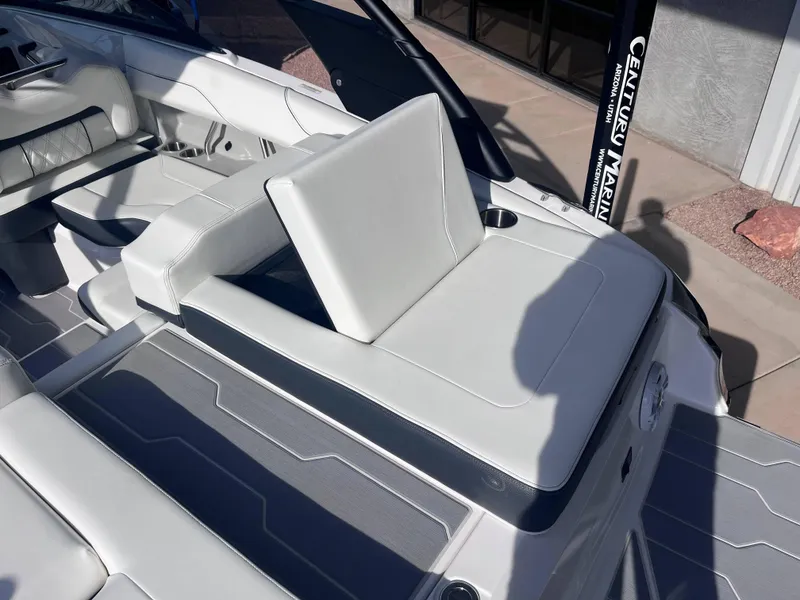 Slide: The Image of 2022 Regal LS2-CM boat interior with white leather seating and modern design. - 4