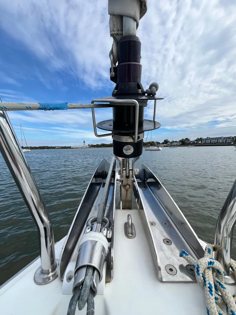 Slide: The Image of Bow view of 2018 Beneteau Oceanis 35.1 sailboat on calm water under blue sky. - 20