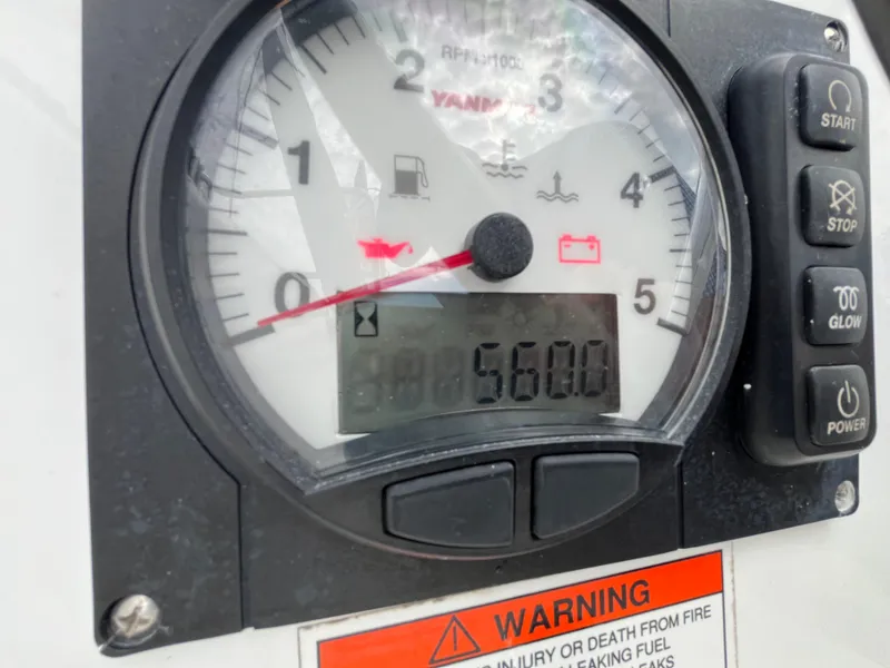Slide: The Image of Close-up of a Yanmar engine gauge on a 2018 Beneteau Oceanis 35.1 sailboat. - 9