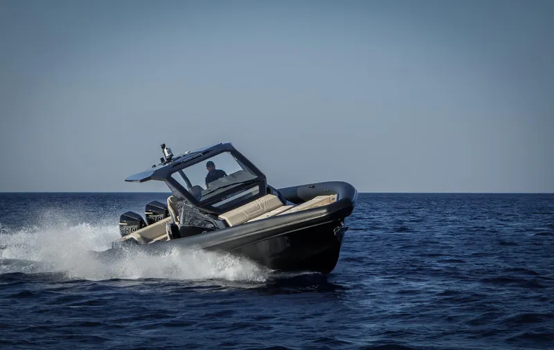 Slide: The Image of 2025 Technohull Alpha 40 speedboat cruising on open water. - 15