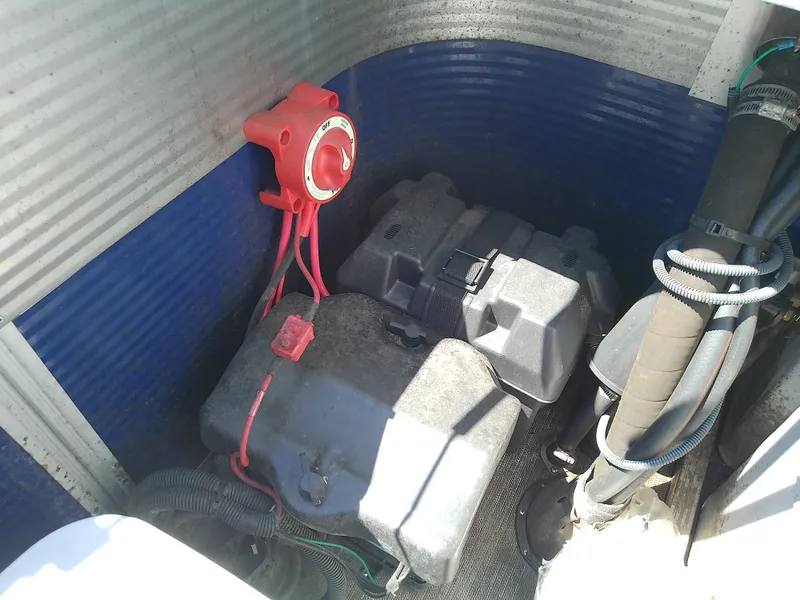 Slide: The Image of 2020 Bennington SV 20 SLV boat battery compartment with wiring and components. - 26
