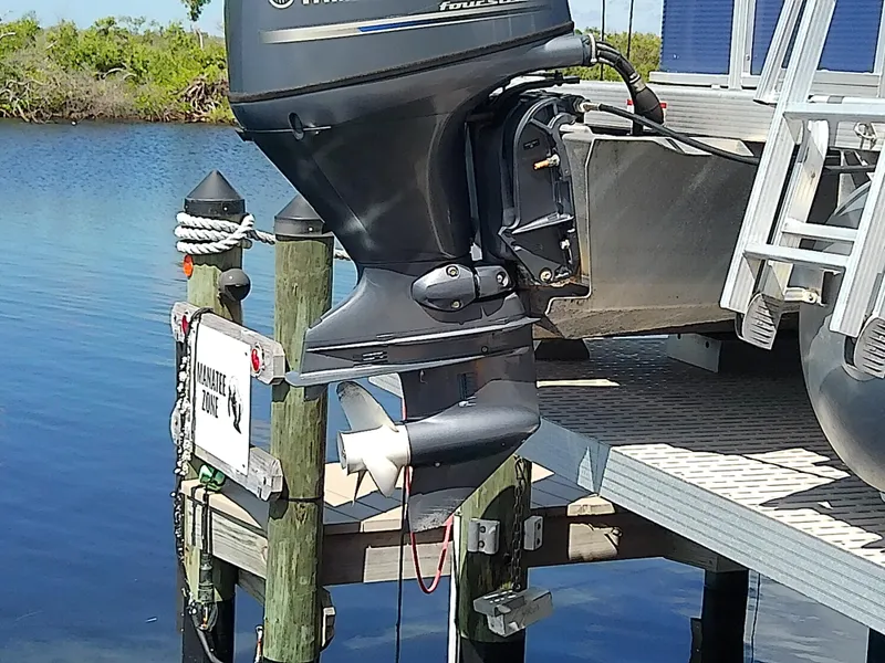 Slide: The Image of 2020 Bennington SV 20 SLV pontoon boat with Yamaha outboard motor at dock. - 9