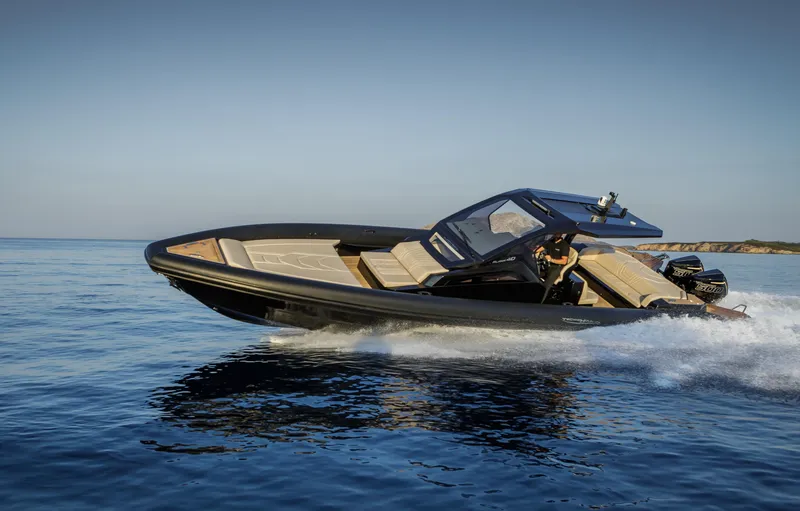 Slide: The Image of Technohull Alpha 40 (2025) speedboat cruising on open water. - 1