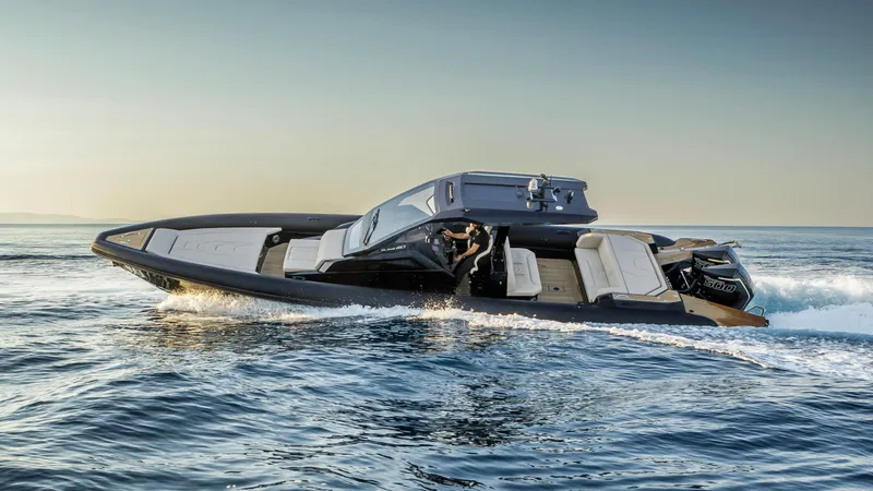 Slide: The Image of 2025 Technohull Alpha 40 cruising on open water, showcasing sleek design and performance. - 11