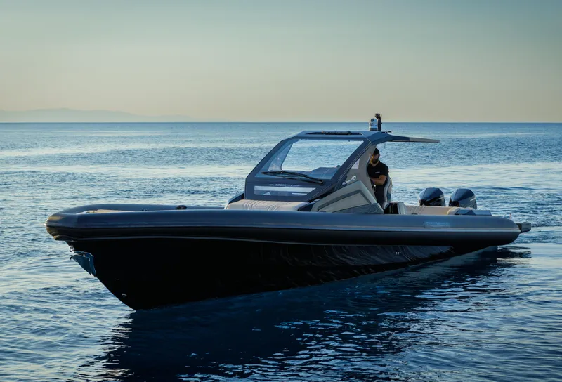 Slide: The Image of 2025 Technohull Alpha 40 luxury speedboat on calm ocean waters. - 12