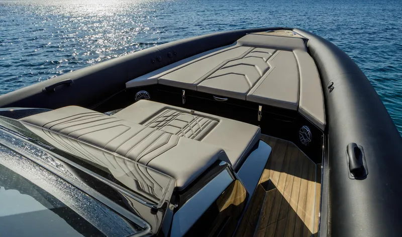Slide: The Image of 2025 Technohull Alpha 40 luxury boat with sleek design on open water. - 16