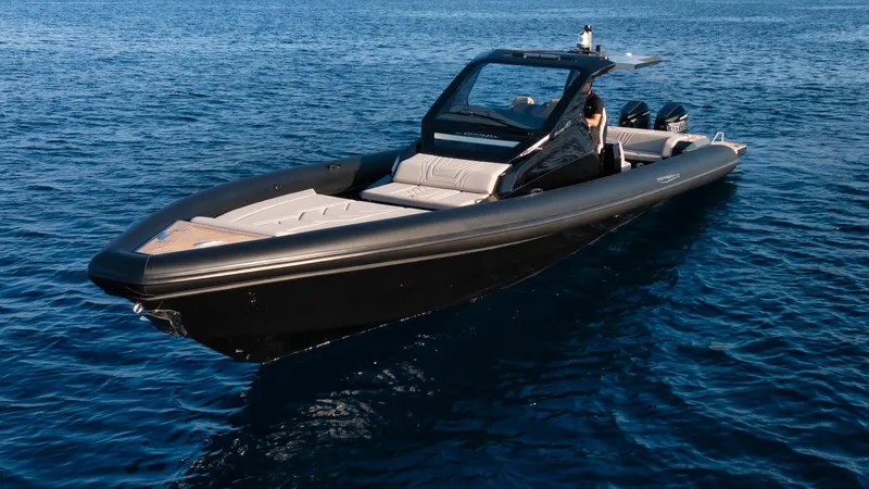Slide: The Image of 2025 Technohull Alpha 40 luxury boat on calm blue water. - 4
