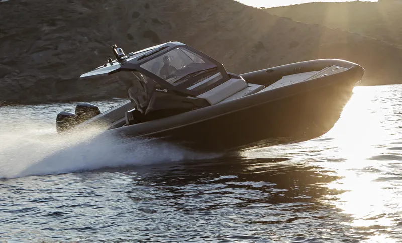 Slide: The Image of Technohull Alpha 40 (2025) speedboat cruising on water at sunset. - 5