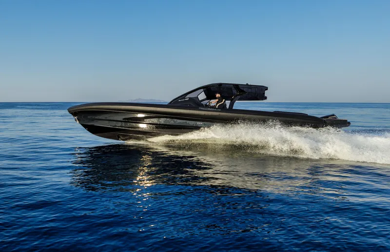 Slide: The Image of 2025 Technohull Alpha 40 speedboat cruising on open water. - 7