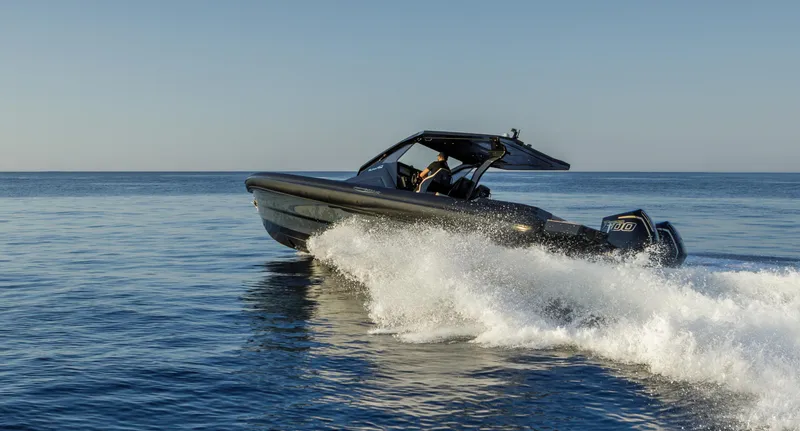 Slide: The Image of 2025 Technohull Alpha 40 speedboat cruising on open water. - 8