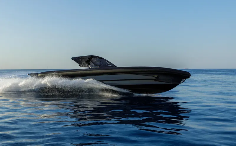 Slide: The Image of Technohull Alpha 40 (2025) speedboat cruising on calm blue sea. - 9