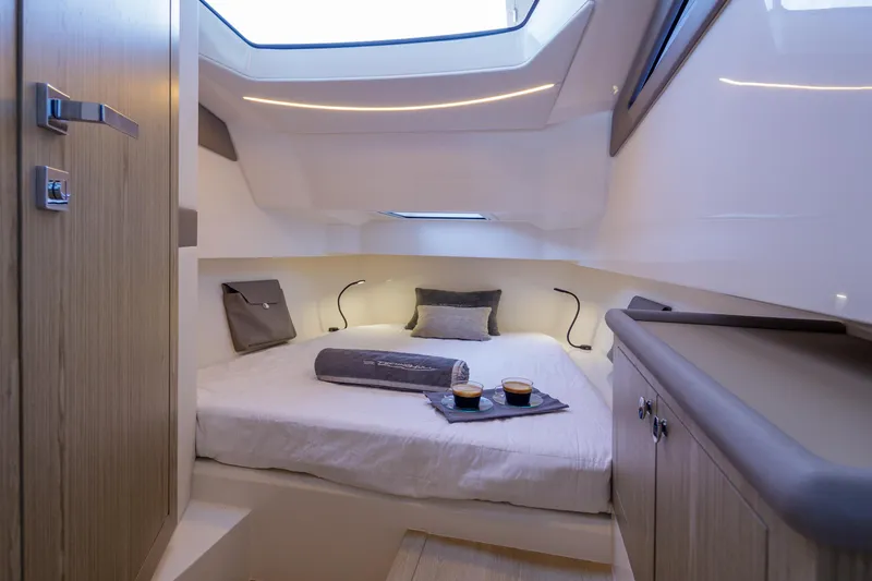 Slide: The Image of Luxurious cabin interior of 2025 Technohull Alpha 40 with modern design and cozy bedding. - 18