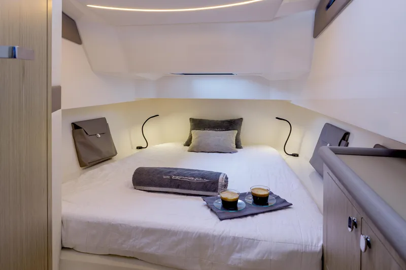 Slide: The Image of Luxurious cabin interior of 2025 Technohull Alpha 40 with cozy bedding and modern lighting. - 17