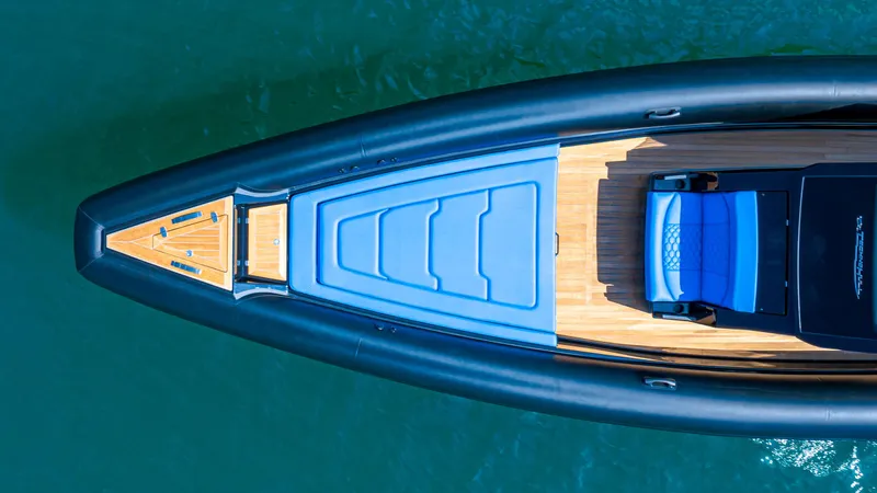 Slide: The Image of Overhead view of 2025 Technohull 38 Grand Sport luxury boat on water. - 7