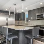 Slide: The Image of Modern kitchen with island and stainless steel appliances, Adonia Allure Trip 2020. - 2
