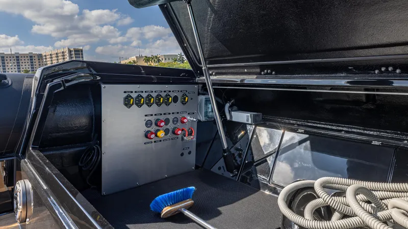 Slide: The Image of Control panel of 2025 Technohull 38 Grand Sport boat with storage compartment. - 28
