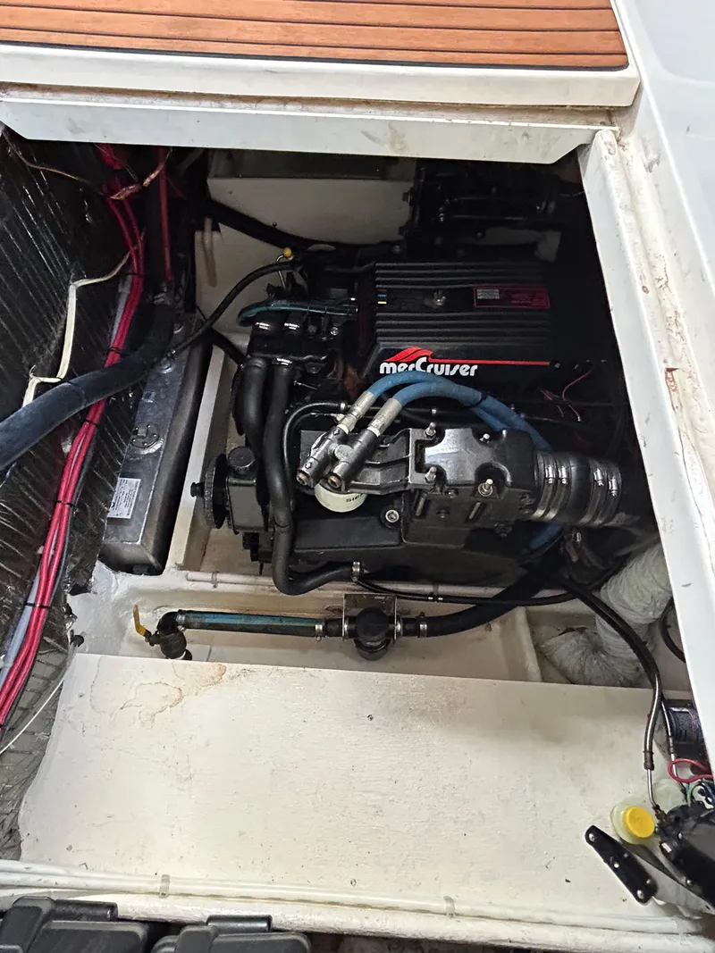 Slide: The Image of Engine compartment of a 1993 Maxum 2700 SCR boat with MerCruiser engine. - 5