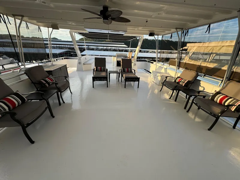 Slide: The Image of Spacious deck of 2004 Sumerset 20x100 houseboat with seating and scenic views. - 13