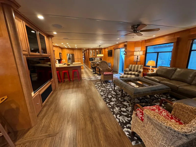 Slide: The Image of Luxurious 2004 Sumerset 20x100 houseboat interior with modern kitchen and cozy living area. - 15