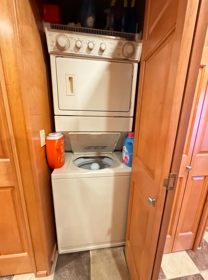 Slide: The Image of Stacked washer and dryer in wooden closet, Sumerset 20x100, 2004 model. - 42