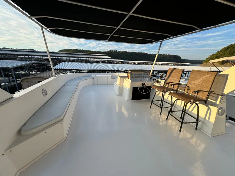 Slide: The Image of Spacious upper deck of 2004 Sumerset 20x100 houseboat with seating and canopy. - 7