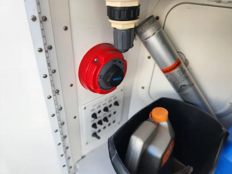 Slide: The Image of Control panel and storage area on a 2002 Formula 37 PC boat. - 14