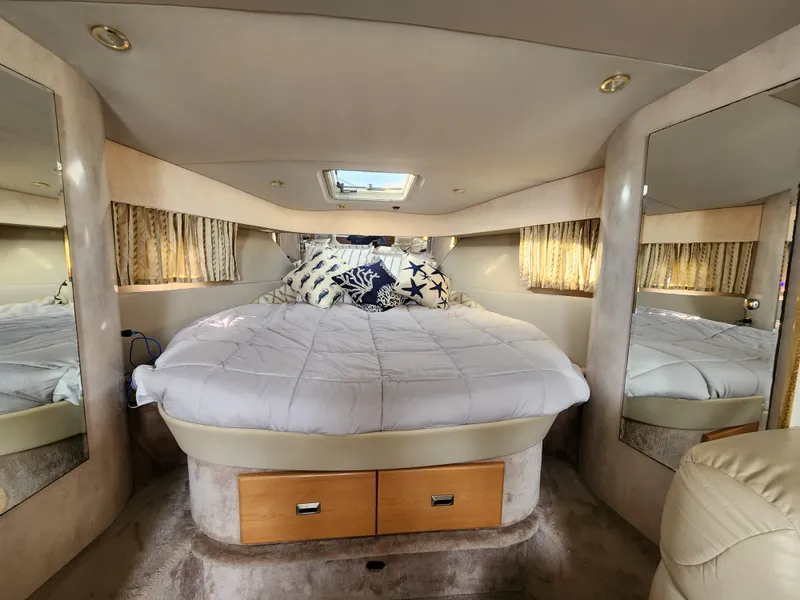 Slide: The Image of Interior of 2002 Formula 37 PC yacht with cozy bed and mirrors. - 20