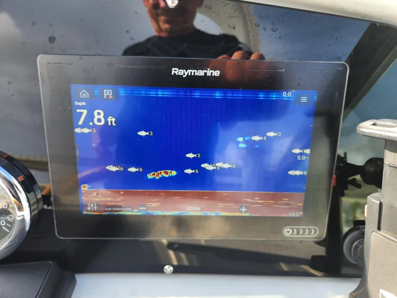 Slide: The Image of Raymarine fish finder display on 2002 Formula 37 PC boat, showing 7.8 ft depth. - 26
