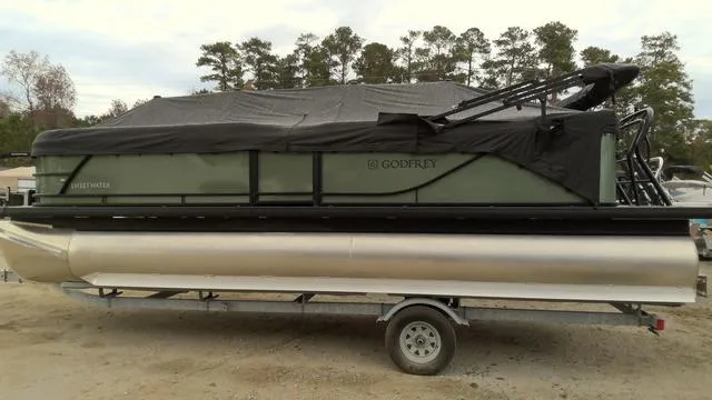 Slide: The Image of 2025 Godfrey Pontoons Sweetwater 2086 CSE with cover, front view. - 1