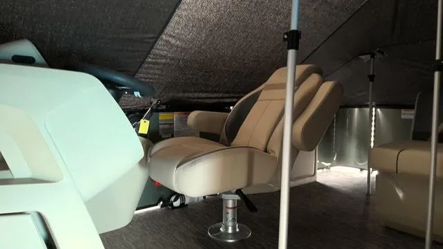 Slide: The Image of Interior of 2025 Godfrey Pontoons Sweetwater 2086 CSE with beige seating and canopy. - 4