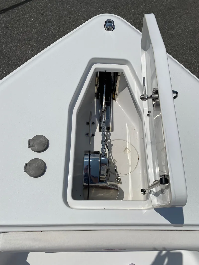 Slide: The Image of 2020 Sea Hunt Gamefish 25 anchor locker with chain and winch. - 21