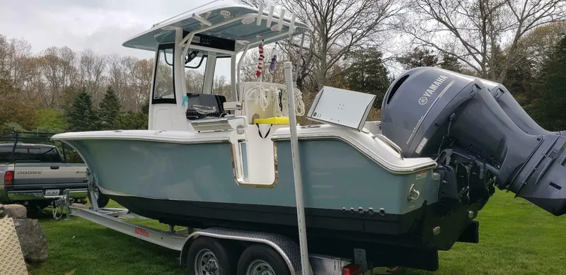 Slide: The Image of 2020 Sea Hunt Gamefish 25 boat on trailer with Yamaha outboard motor. - 6