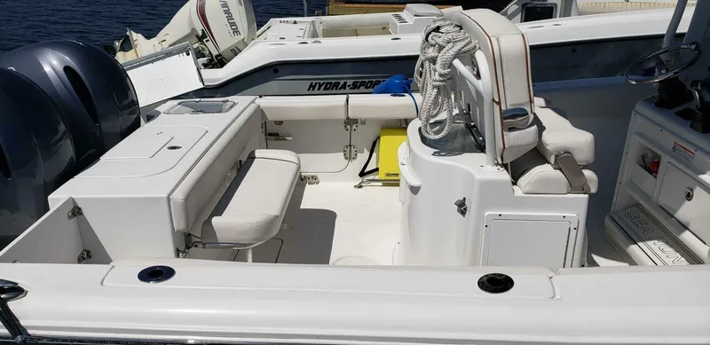 Slide: The Image of 2020 Sea Hunt Gamefish 25 boat interior with seating and storage. - 9