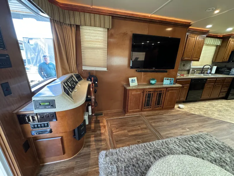 Slide: The Image of Luxurious 2012 Horizon 16x66 houseboat interior with modern kitchen and entertainment area. - 20
