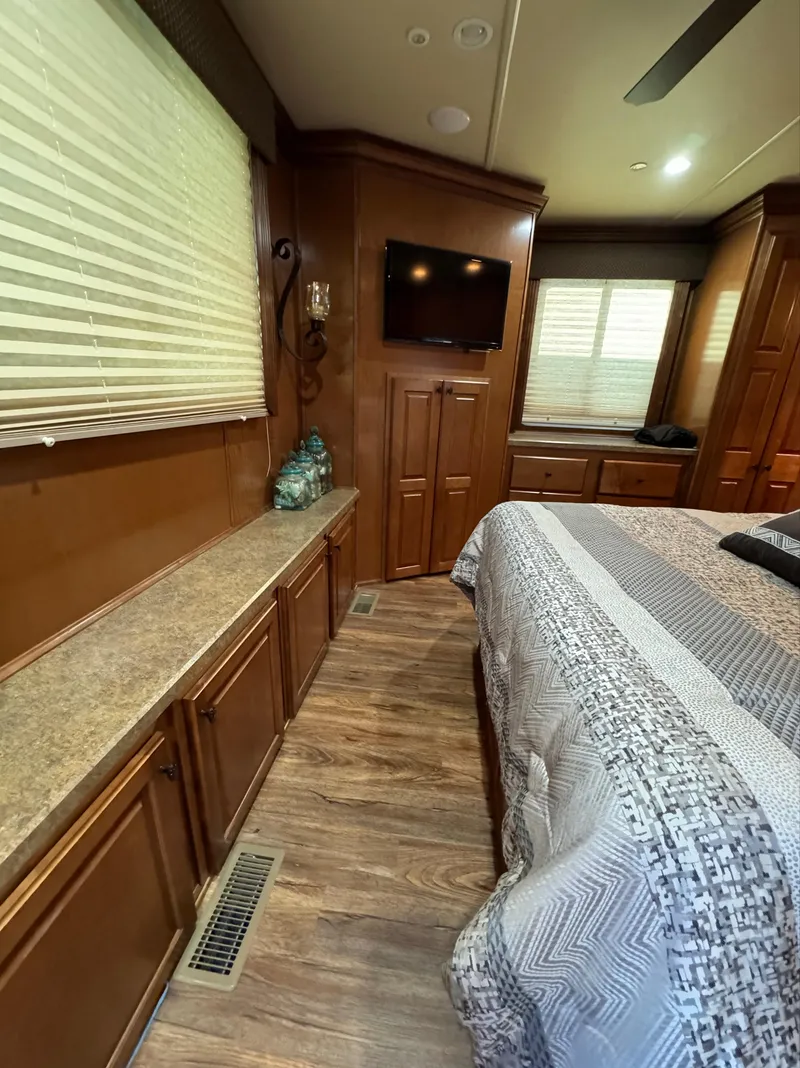 Slide: The Image of Luxurious 2012 Horizon 16x66 houseboat interior with wood flooring and modern decor. - 43