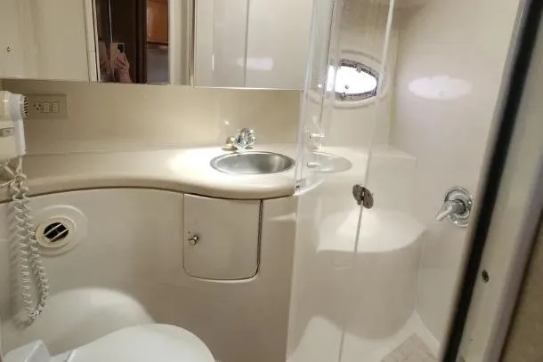 Slide: The Image of 2001 Regal Commodore 4160 yacht bathroom with sink, shower, and toilet. - 10