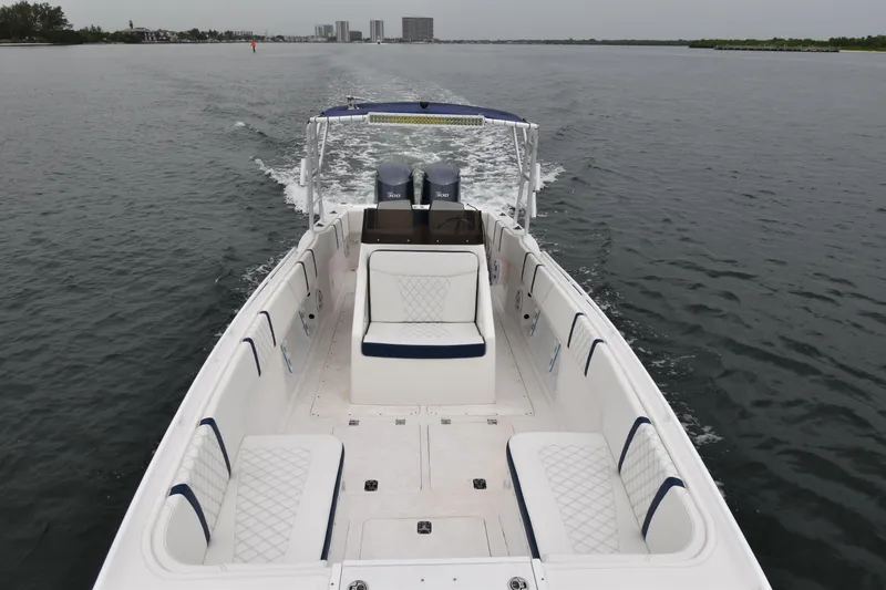 Slide: The Image of 1984 Chris-Craft Scorpion boat cruising on a calm waterway. - 7