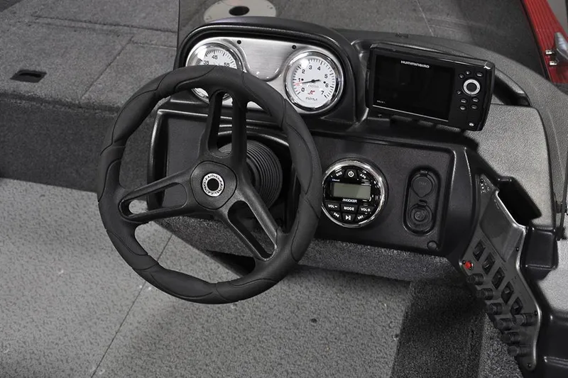 Slide: The Image of 2025 Lund 1650 Angler SS boat interior with two seats and steering console. - 6