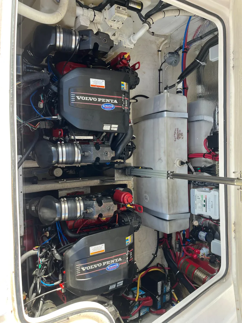 Slide: The Image of 2013 Regal 30 Express engine compartment with dual Volvo Penta engines. - 28