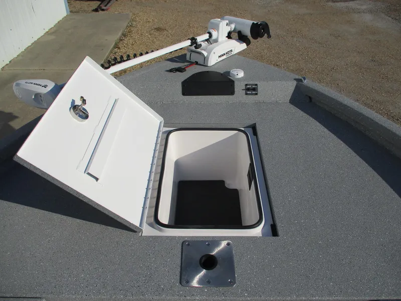 Slide: The Image of 2025 Vexus ACX 2150 boat with open storage compartment and trolling motor. - 16