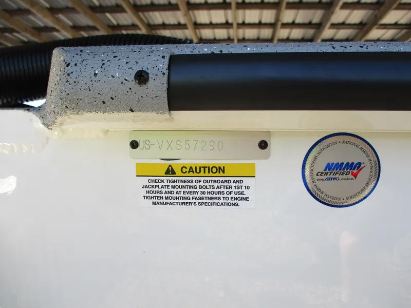 Slide: The Image of Hull identification number on 2025 Vexus ACX 2150 boat with caution label and certification sticker. - 18