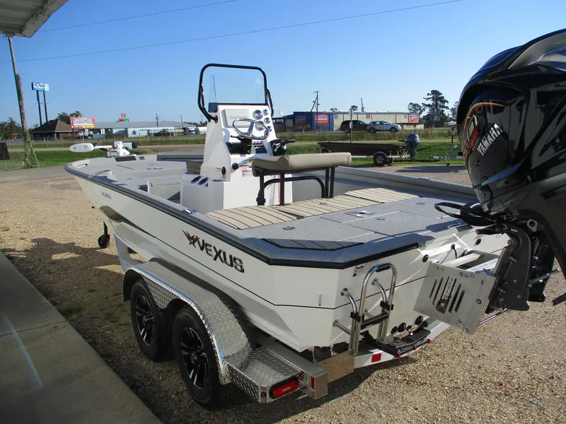 Slide: The Image of 2025 Vexus ACX 2150 boat on trailer, featuring sleek design and powerful engine. - 4