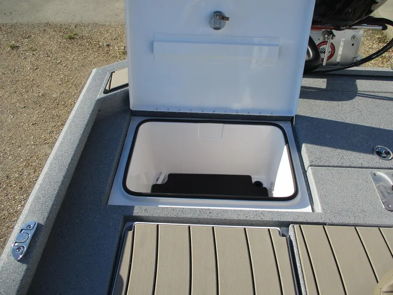 Slide: The Image of 2025 Vexus ACX 2150 boat storage compartment with open lid, showcasing interior space. - 7