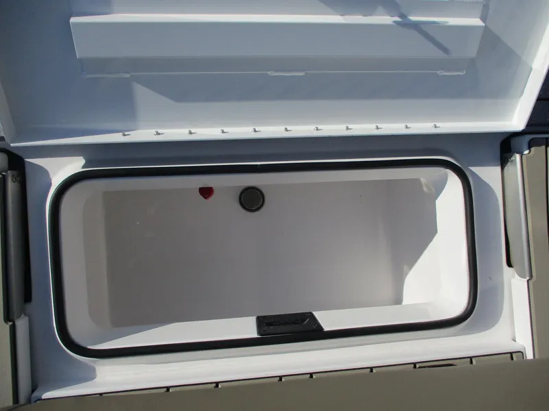 Slide: The Image of Open storage compartment of 2025 Vexus ACX 2150 boat. - 9