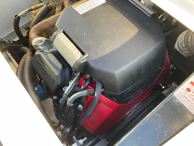 Slide: The Image of Honda engine in a 2013 Sealegs 7.7m Cabin boat. - 14